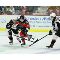 Vancouver Giants defenseman Evan Toth (left) vs. the Kelowna Rockets