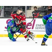 Red Deer Rebels defenceman Christoffer Sedoff (right) vs. the Swift Current Broncos