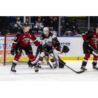 Vancouver Giants centre Craig Armstrong (left) vs. the Kelowna Rockets