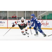 Belleville Senators defenceman Jonathan Aspirot (left) vs. the Syracuse Crunch