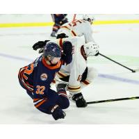 Vancouver Giants left wing Adam Hall gets tripped up by the Kamloops Blazers