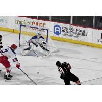 Allen Americans goaltender Antoine Bibeau awaits a Kansas City Mavericks shot