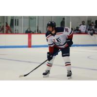 Defenseman C.J. Valerian with New England College