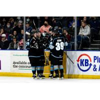 Winnipeg ICE celebrate a goal against the Lethbridge Hurricanes