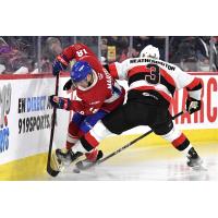 Belleville Senators defenceman Dillon Heatherington (right) vs. the Laval Rocket