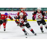 Prince George Cougars centre Riley Heidt leads the charge against the Portland Winterhawks