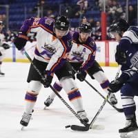 Reading Royals forward Grant Cooper collects the puck