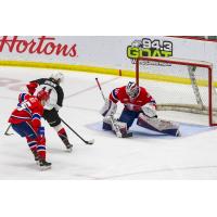 Prince George Cougars right wing Caden Brown looks for a shot against the Spokane Chiefs