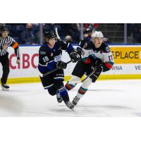 Kelowna Rockets centre Colton Dach (right) vs. the Victoria Royals