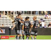 Louisville City FC celebrates a goal