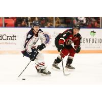 Vancouver Giants defenceman Evan Toth (right) vs. the Tri-City Americans