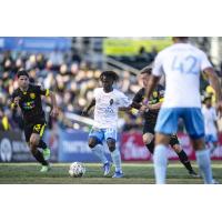 Las Vegas Lights FC midfielder Frank Daroma with possession vs. New Mexico United
