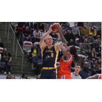 Jordan Baker of the Edmonton Stingers takes a shot against Cangrejeros of Puerto Rico