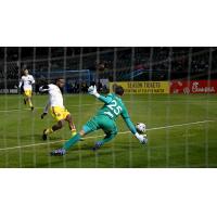 Pittsburgh Riverhounds SC forward Dane Kelly takes a shot against Memphis 901 FC