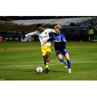 Pittsburgh Riverhounds SC forward Dane Kelly (left) vs. Memphis 901 FC