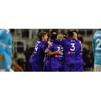 Louisville City FC celebrates a goal against Miami FC