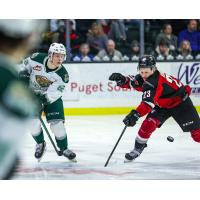 Vancouver Giants right wing Kyle Bochek (right) vs. the Everett Silvertips
