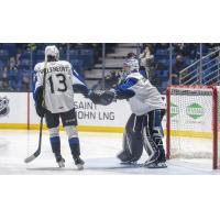 William Villeneuve and goaltender Thomas Couture of the Saint John Sea Dogs