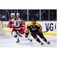 Grand Rapids Griffins center Josh Dickinson (left) vs. the Ontario Reign