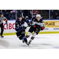 Kelowna Rockets centre Colton Dach (right) vs. the Victoria Royals
