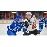 Wichita Thunder forward Carter Johnson (left) vs. the Kansas City Mavericks
