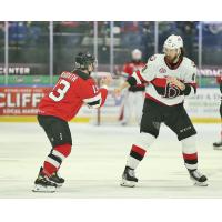 Belleville Senators right wing Scott Sabourin (right) ready to mix it up vs. the Utica Comets