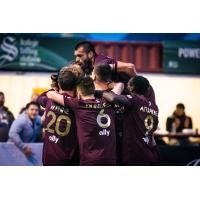 Detroit City FC celebrates a goal