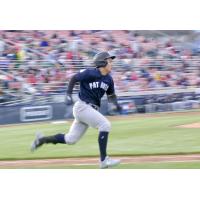 Anthony Volpe of the Somerset Patriots races to first