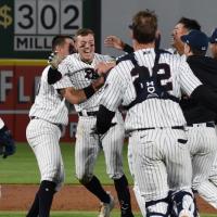 Brandon Lockridge and the Somerset Patriots celebrate a walk-off win