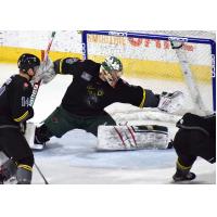 Iowa Heartlanders defend a shot against the Allen Americans