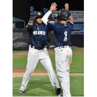 Somerset Patriots second baseman Jesus Bastidas (right) congratulates center fielder Jeisson Rosario