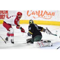 Spencer Asuchak of the Allen Americans (left) vs. the Iowa Heartlanders