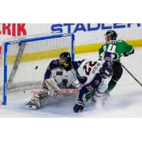 Trey Bradley watches his goal against the Tulsa Oilers