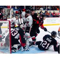 Prince George Cougars defend against the Portland Winterhawks