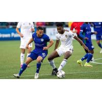 Detroit City FC midfielder Abdoulaye Diop (right) vs. Hartford Athletic