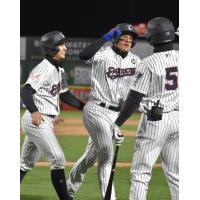 Derek Dietrich of the Somerset Patriots rounds the bases following his grand slam