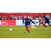 Chicago Fire FC midfielder Xherdan Shaqiri plays the ball ahead against the New York Red Bulls