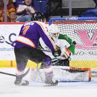 Reading Royals forward Trevor Gooch watches his shot against the Maine Mariners