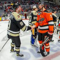 Wheeling Nailers and Fort Wayne Komets shake hands following Wheeling's Game Seven win