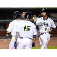 Enrique Valdez of the Columbia Fireflies scores after his three-run homer
