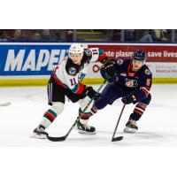 Kelowna Rockets forward Pavel Novak (left)
