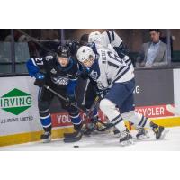 Saint John Sea Dogs centre Connor Trenholm (left) vs. the Rimouski Oceanic