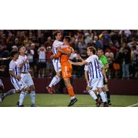Louisville City FC celebrates a goal against Detroit City FC