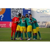 Oakland Roots huddle against Las Vegas Lights FC