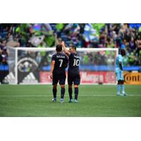Seattle Sounders FC midfielders Cristian Roldán and Nicolás Lodeiro