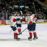 Maine Mariners celebrate in their Sea Dogs Crossover Night uniforms