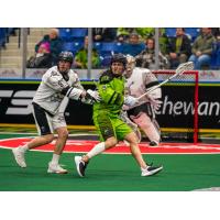 Calgary Roughnecks' Kieran McKay versus Saskatchewan Rush's Ryan Keenan