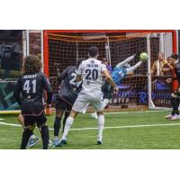 St. Louis Ambush's Brian Bement and Florida Tropics' Thiago Freitas on the field