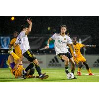 Arturo Ordóñez of Pittsburgh Riverhounds SC with possession against the Maryland Bobcats FC