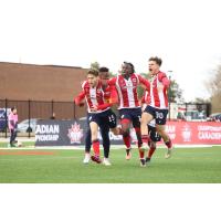Atlético Ottawa celebrates a goal against Halifax Wanderers FC